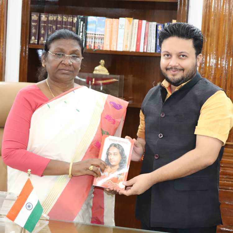 Presenting book to Hon'ble President of India